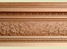 Oak leaf and acorn carving on an elaborate architrave